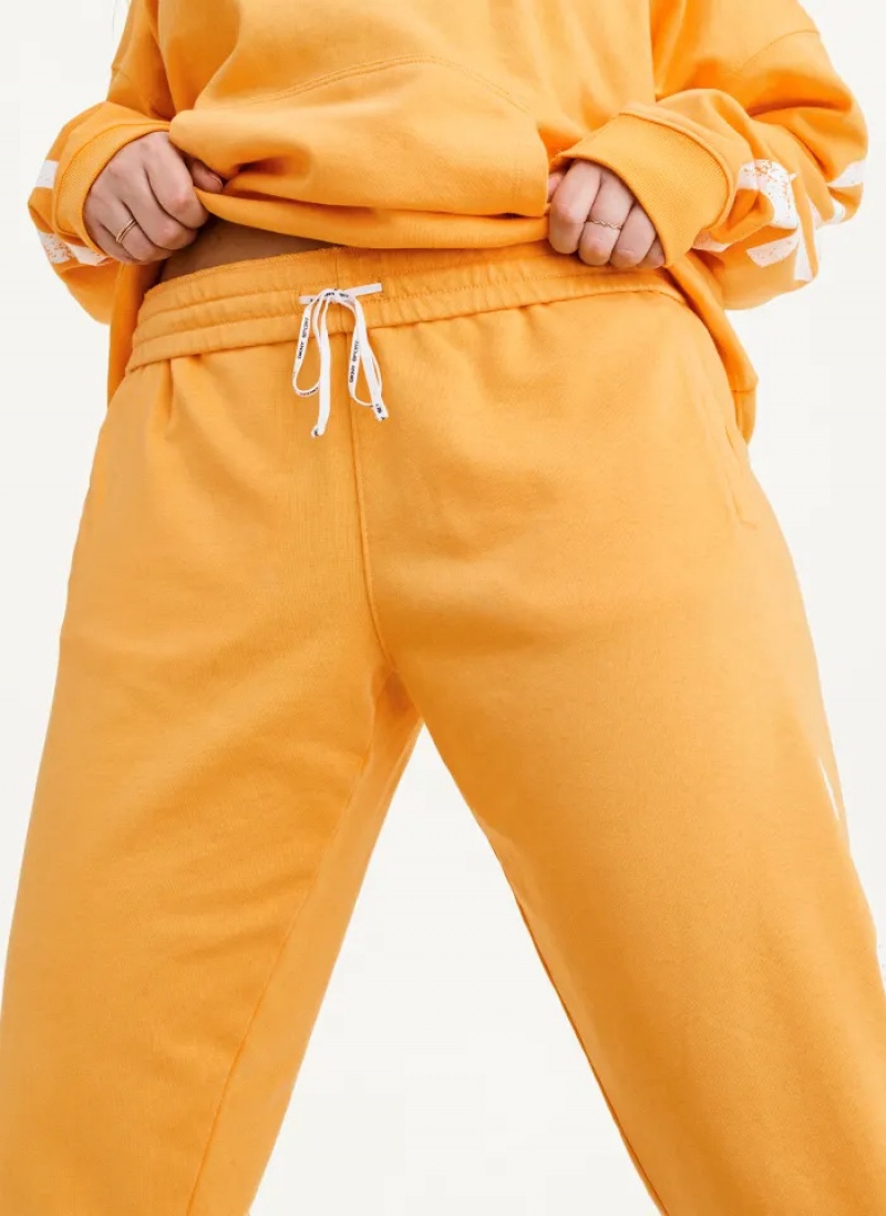 Yellow Women's Dkny Pigment Dye Distressed Crackle Logo Jogger Pants | 6183UWIMX